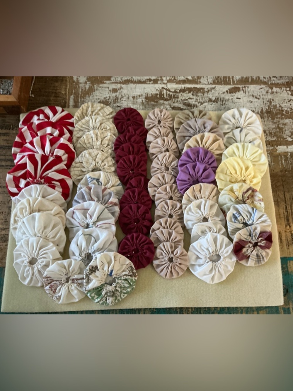Handmade vintage Fabric Yo-Yo Quilt Pieces, total of 50!